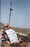 The sign on the cairn